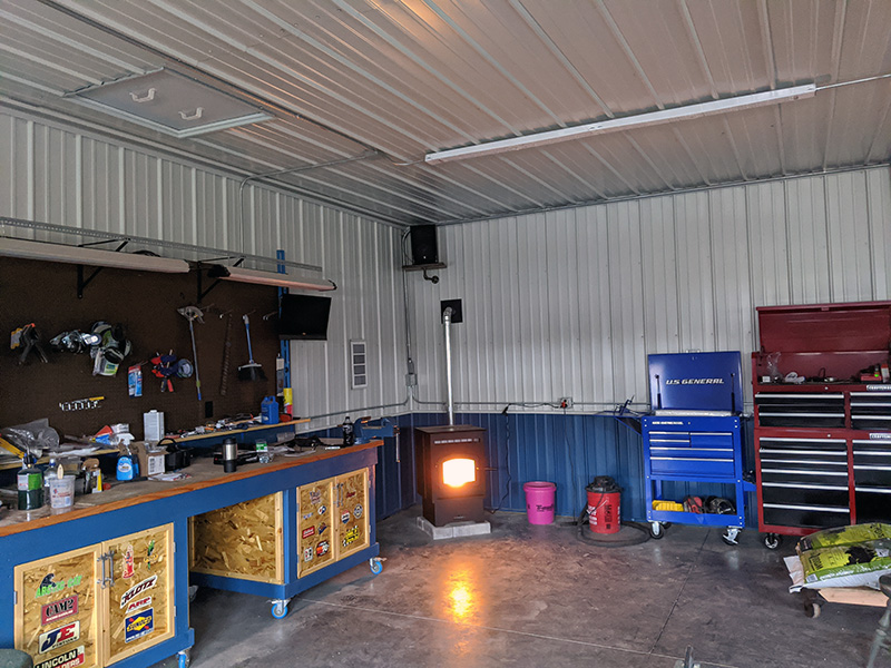 Workshop interior showing tool carts and work bench area