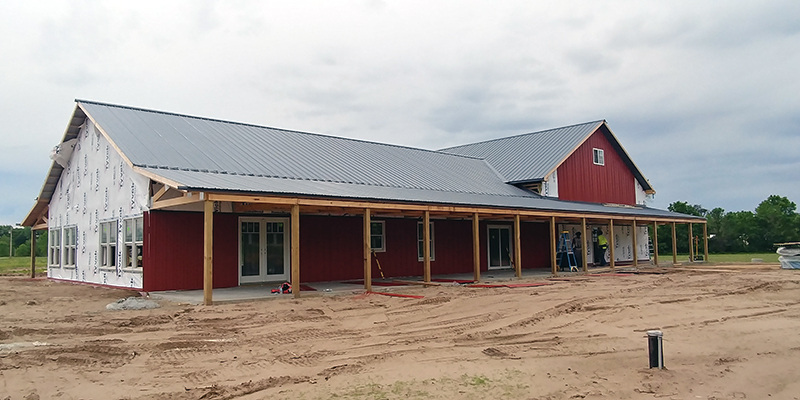 StewBer Buildings crew working on construction of a shouse